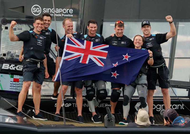 New Zealand SailGP crew with their national flag on board their F50 after winning the final race on Race Day 2 of the Singapore Sail Grand Prix  photo copyright Bob Martin/SailGP taken at  and featuring the F50 class