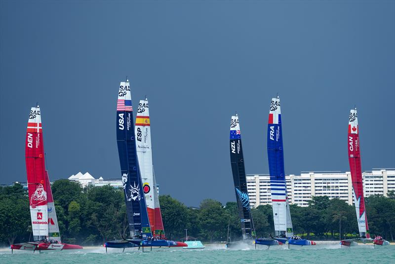Teams take part in a practice session as the storm clouds gather over the city ahead of the Singapore Sail Grand Prix  photo copyright Bob Martin/SailGP taken at Singapore Yacht Club and featuring the F50 class