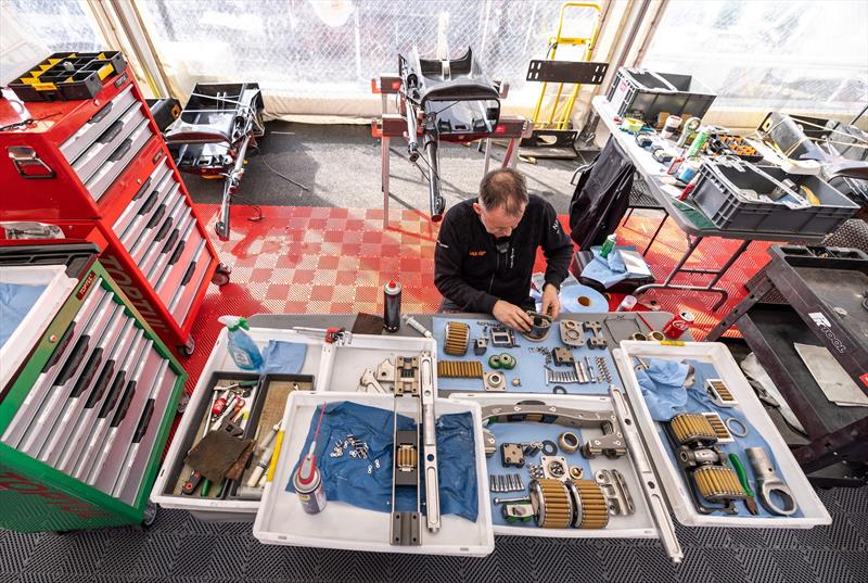 A member of the SailGP technical team works on the hydraulic components of the F50 catamarans in the technical area ahead of the ITM New Zealand Sail Grand Prix  photo copyright Felix Diemer/SailGP taken at Royal New Zealand Yacht Squadron and featuring the F50 class