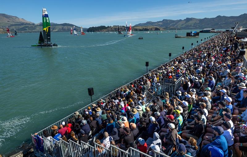 Spectators watch the Australia SailGP Team cross the finish line to win Race 1 on Race Day 2 of the ITM New Zealand Sail Grand Prix in Christchurch, New Zealand photo copyright Brett Phibbs for SailGP taken at  and featuring the F50 class