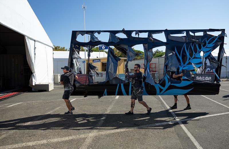 New Zealand SailGP Team members carry the damaged wing back to the team hangar on Race Day 1 of the France Sail Grand Prix in Saint-Tropez, France. Sept 9, 2023 - photo © Ian Walton/SailGP