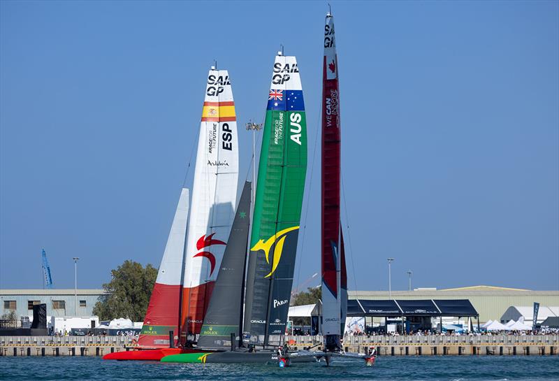 Canada SailGP Team helmed by Phil Robertson with Australia SailGP Team helmed by Tom Slingsby and Spain SailGP Team helmed by Diego Botin on Race Day 1,United Arab Emirates. 13th January photo copyright Felix Diemer taken at Abu Dhabi Sailing & Yacht Club and featuring the F50 class