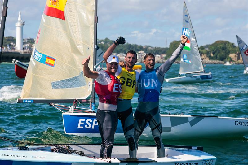 Finn class medallists (l-r) Joan Cardona (ESP) bronze, Giles Scott (GBR) gold, Zsombor Berecz (HUN) silver at the Tokyo 2020 Olympic Sailing Competition - photo © Sailing Energy / World Sailing