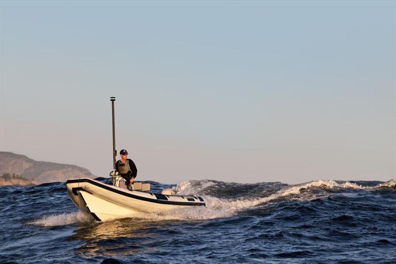 An NZ Olympic team coachboat with Windbot operating on the Atalntic Ocean course during the 2016 Olympic Regatta photo copyright Richard Gladwell taken at  and featuring the Finn class