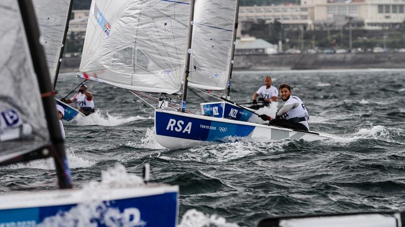 Tokyo2020 - Day 3 - July, 27, - Enoshima, Japan. Finns in a squall photo copyright Richard Gladwell - Sail-World.com / nz taken at Takapuna Boating Club and featuring the Finn class