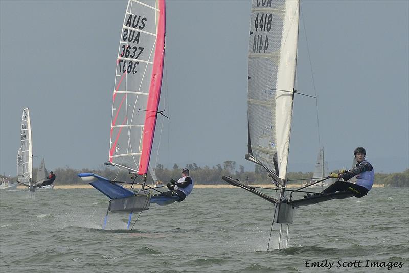 Kirstin Norris and Stacey Jackson battling it to the finish line photo copyright Emily Scott Images taken at Royal Queensland Yacht Squadron and featuring the International Moth class