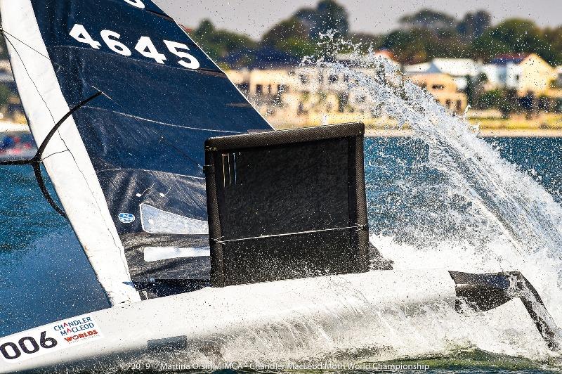 Matt Chew goes for a swim on the first day of finals racing - 2019 Chandler Macleod Moth Worlds - photo © Martina Orsini