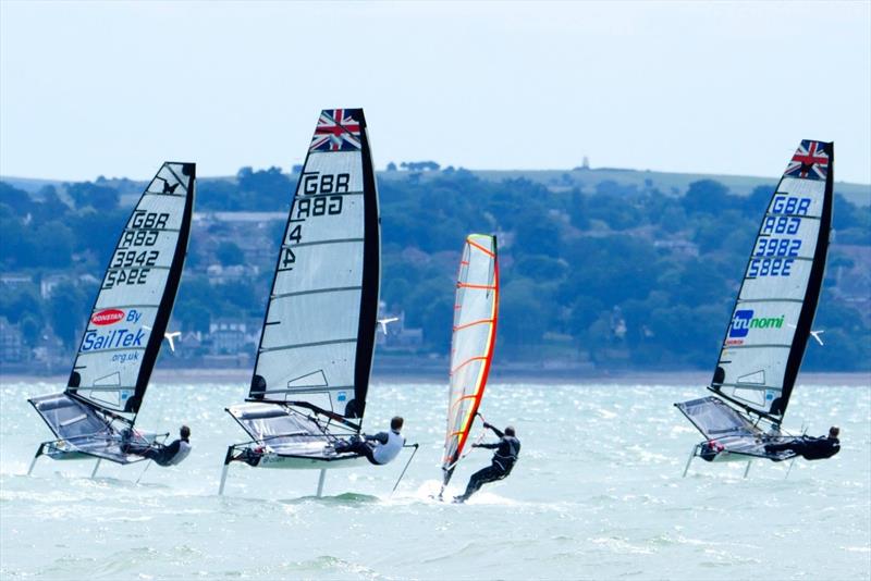 3 Moths and a windsurfer at Stokes Bay - photo © Lorraine Budgen