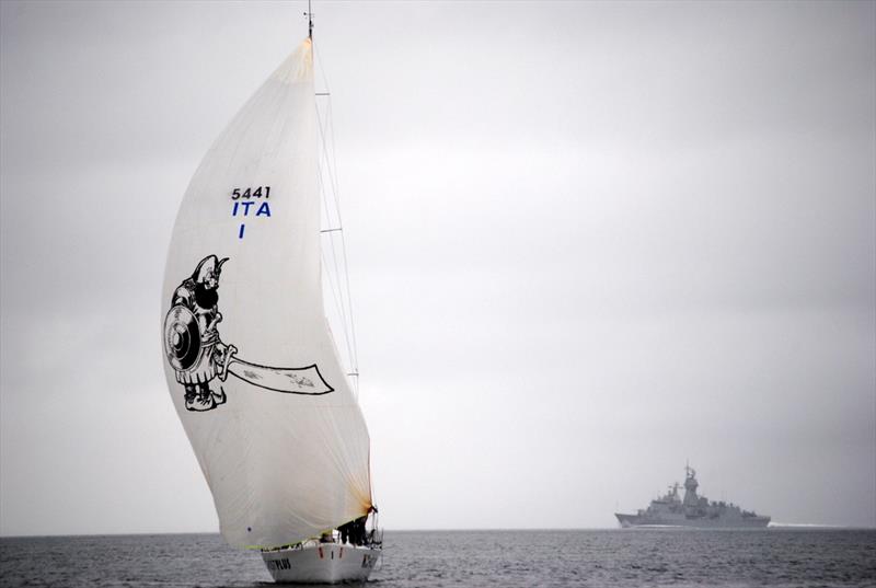 A navy ship sweeps up the River Derwent during the Crown Series Bellerive Regatta as Host Plus Executive nears the leeward mark photo copyright Peter Campbell taken at Bellerive Yacht Club and featuring the IRC class