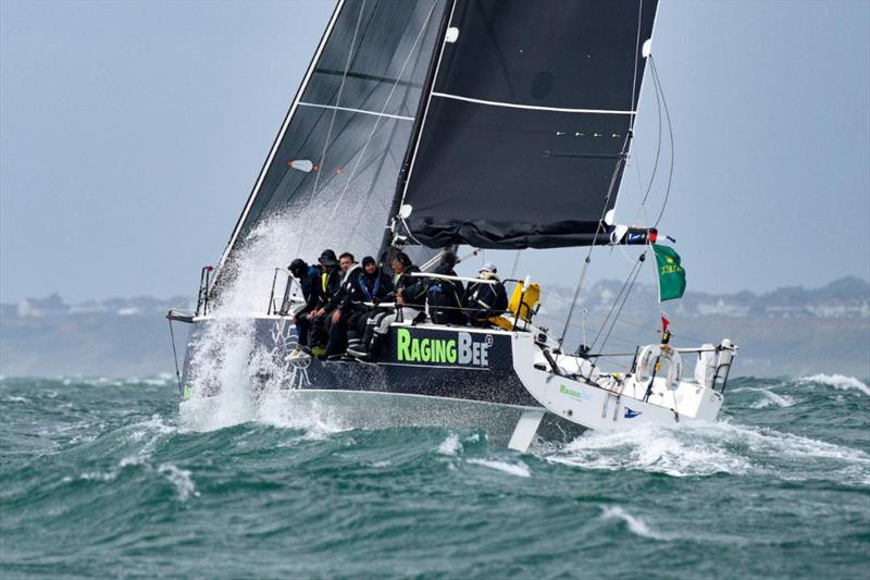 Raging-bee² is battling with three others for the lead in IRC Three after rounding the Fastnet Rock in the Rolex Fastnet Race photo copyright Rick Tomlinson / www.rick-tomlinson.com taken at Royal Ocean Racing Club and featuring the IRC class
