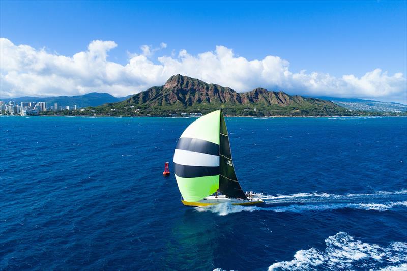 Taxi Dancer making an iconic finish at Diamond Head in 2019 photo copyright Sharon Green/Ultimate Sailing taken at Transpacific Yacht Club and featuring the IRC class
