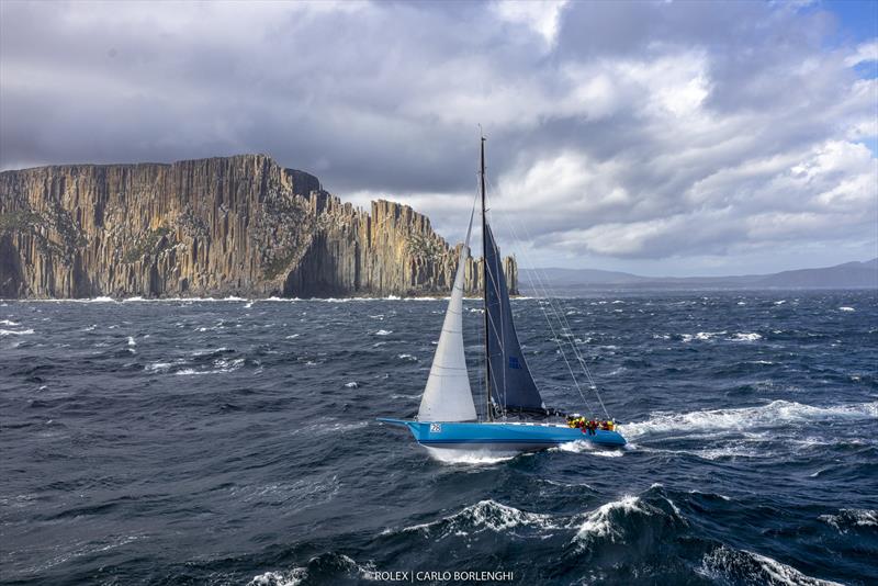 The Santa Cruz 70 Antipodes (Geoff Hill HKG) flies around Tasman Island - 2022 Rolex Sydney Hobart photo copyright Carlo Borlenghi taken at Cruising Yacht Club of Australia and featuring the IRC class