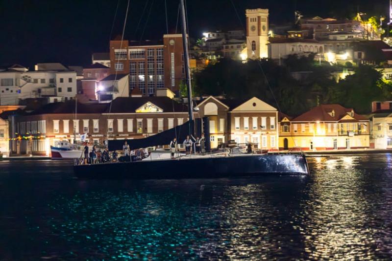 VO65 Sisi makes her way along the Carenage in St George's before a jubilant dockside welcome at Port Louis Marina Grenada photo copyright Arthur Daniel / RORC taken at Royal Ocean Racing Club and featuring the IRC class