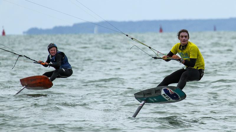 Justina Kitchen is chased out of the start by Hugo Wigglesworth - Day 3 - Kiteboards - Oceanbridge NZL Sailing Regatta - Takapuna BC February 19, 2022 - photo © Richard Gladwell / Sail-World.com / nz