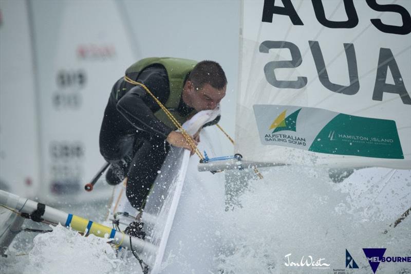 Russian sailor Sergei Komissarov capsizes after tangling another competitor's mainsheet - 2020 Laser World Championships - photo © Jon West Photography
