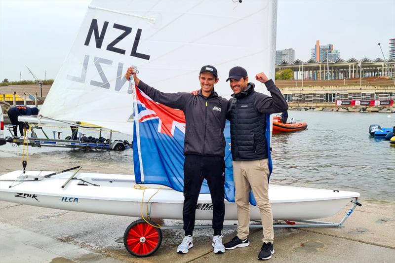 Tom Saunders celebrates with coach Mike Bullot - Laser/ILCA7 World Championship - Barcelona - November 2021 photo copyright Yachting NZ taken at  and featuring the ILCA 7 class