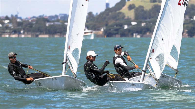 A pre-mark rounding discussion - from left Luke Cashmore, George Gautrey and Tom Saunders - ILCA7 - Oceanbridge NZL Sailing Regatta - Takapuna BC - February 18, - photo © Richard Gladwell - Sail-World.com/nz