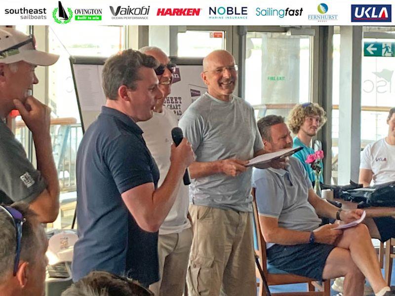 David Richardson at the Harken welcome evening prize draw - 2022 ILCA Nationals at Hayling Island photo copyright Georgie Altham taken at Hayling Island Sailing Club and featuring the ILCA 7 class