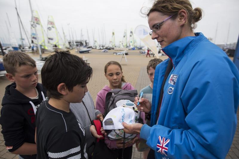 Ali Young (Laser Radial) signs autographs for schoolchildren on day 3 of ISAF Sailing World Cup Weymouth photo copyright onEdition taken at Weymouth & Portland Sailing Academy and featuring the ILCA 6 class