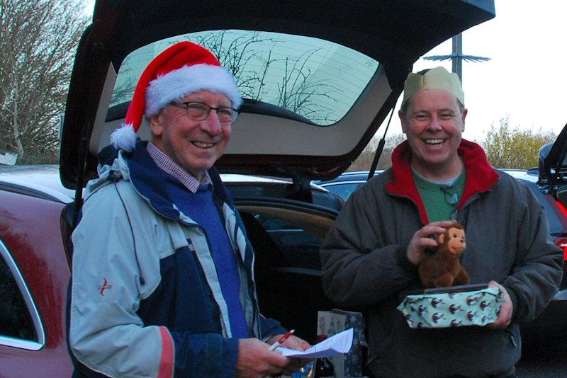 RO Martin Crysell handing over the trophy to the winner, Rob Vice - Brass Monkey and GAMES 10 event at Guildford photo copyright Roger Stollery taken at Guildford Model Yacht Club and featuring the Marblehead class