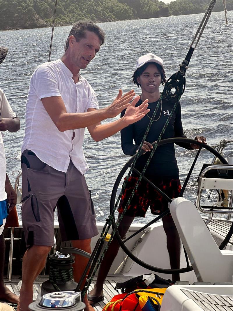 Youth Yacht Charter Program - Learning to helm with Thor photo copyright SVG Sailing taken at  and featuring the Marine Industry class