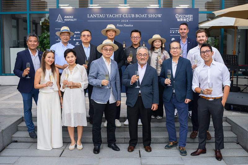 Mr Victor Cha, Chairman of HKR International Limited (third right, front row), Mr David Lee, Director, Hong Kong Property of CITIC Pacific Limited (third left, front row), Mr Jackie Tang, MD of HKR International Limited (second right, front row) & guests - photo © Lantau Yacht Club