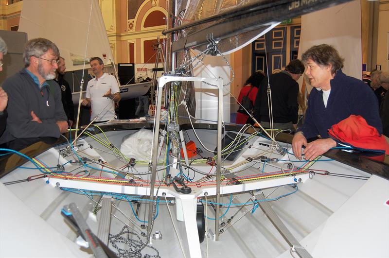 Jon Turner (starboard hand side) explaining the virtues of the true one string system to none other than Mike McNamara. At the heart of the system is the ‘big wheel of love' which can just be seen at the rear of the plate case photo copyright Henshall taken at RYA Dinghy Show and featuring the Merlin Rocket class