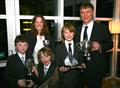 The Kerr family carry off the silverware at Henley SC's presentation © Finn Kerr