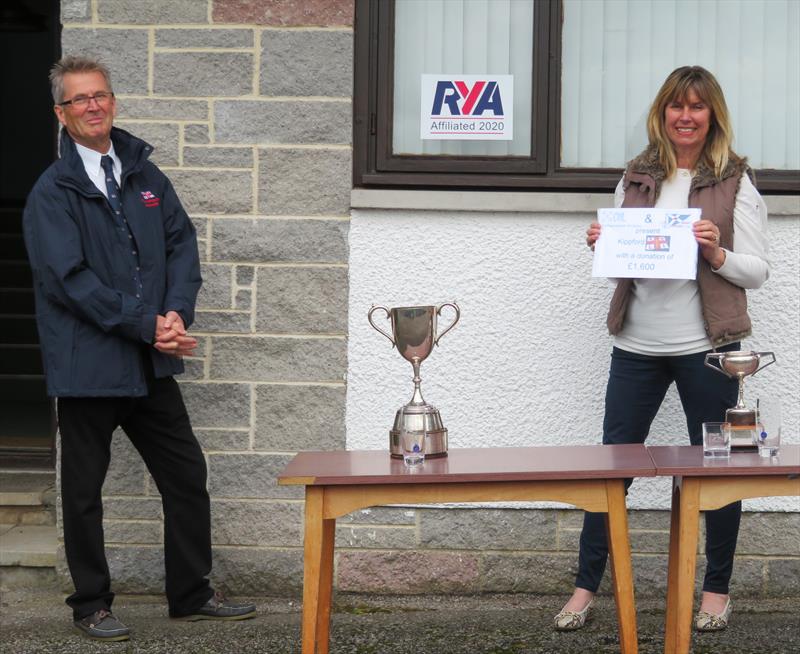Presenting the cheque during the Catherinefield Windows RNLI Regatta in Kippford photo copyright John Sproat taken at Solway Yacht Club