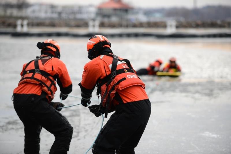 A Coast Guard Station Burlington ice rescue team trains using an ice rescue shuttle board in Burlington Bay on Lake Champlain, January 11, 2017. The team trains using several different techniques designed to rescue people who have fallen through the ice photo copyright U.S. Coast Guard / Andrew Barresi taken at 