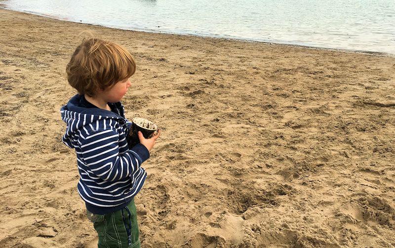 Involving children in a beach clean educates them, but can still be fun photo copyright Gael Pawson taken at 