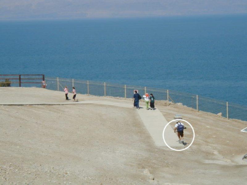 Dead Sea beach walk with armed civilian. - photo © Hugh & Heather Bacon