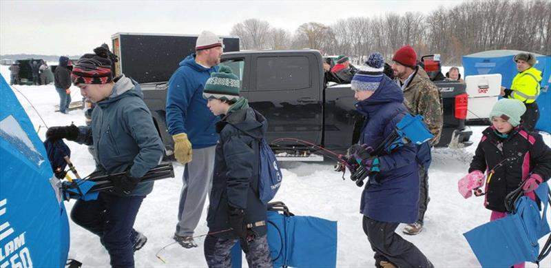 Chisago Lake was a hub of activity as more than 75 youth and their families turned out for the USA's Take Kids Ice Fishing Day photo copyright Union Sportsmen’s Alliance taken at 