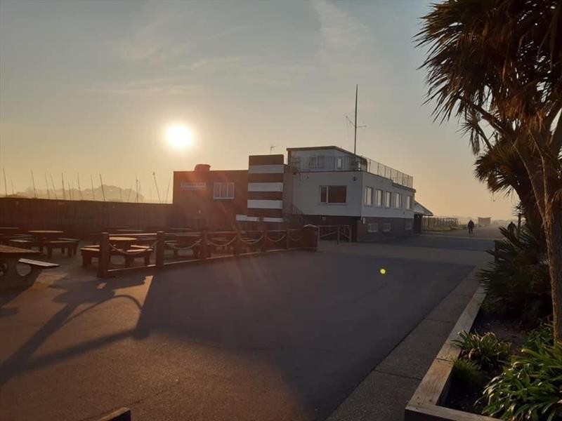 Stokes Bay Sailing Club at sunrise photo copyright Gavin Brewer taken at Stokes Bay Sailing Club