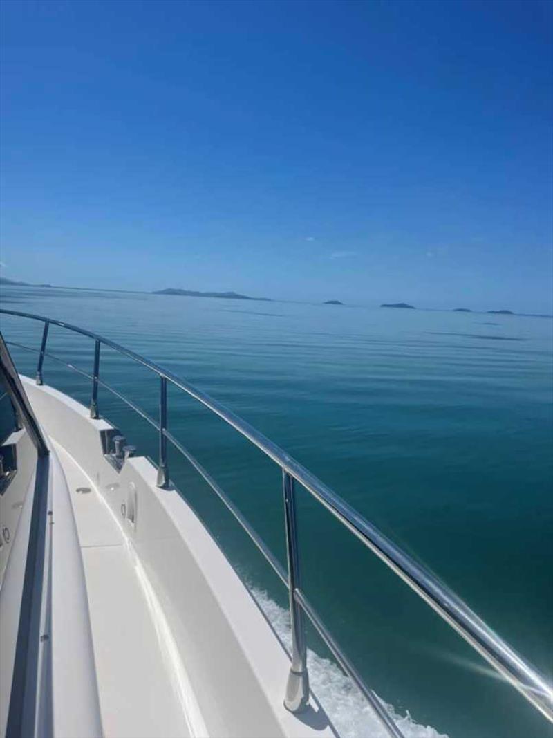 Dunk Island in the distance photo copyright Whitehaven Motor Yachts taken at 