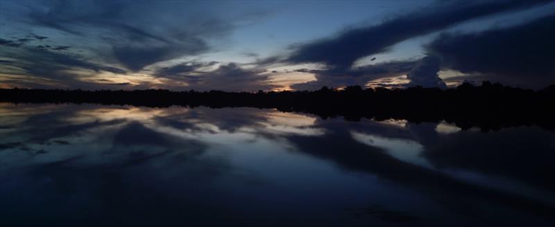 Rain clouds gathering over an evening on the Jauaperi river - from Garden of Evil - photo © Mediawave
