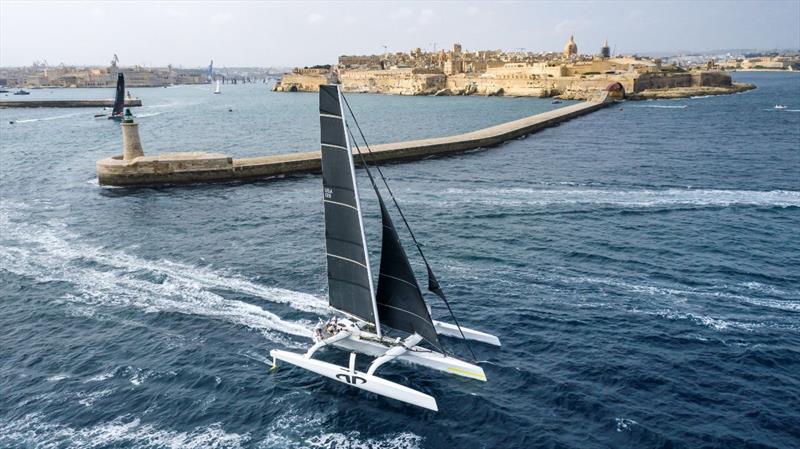 Jason Carroll's turboed MOD70 trimaran Argo leaves Valletta on the 2021 Rolex Middle Sea Race, en route to setting a new race record photo copyright Rolex / Kurt Arrigo taken at Middle Harbour Yacht Club and featuring the MOD70 class