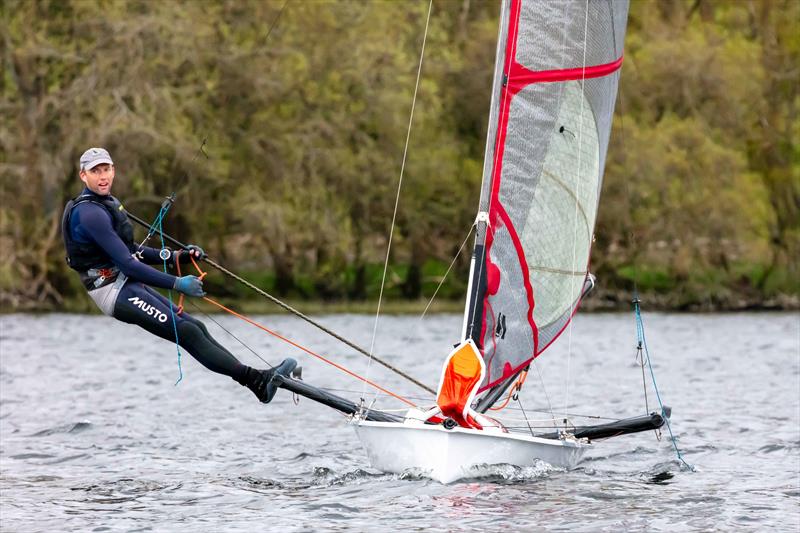 Sam Pascoe wins the Musto Skiff class at the Ullswater Yacht Club Daffodil Regatta photo copyright Tim Olin / www.olinphoto.co.uk taken at Ullswater Yacht Club and featuring the Musto Skiff class