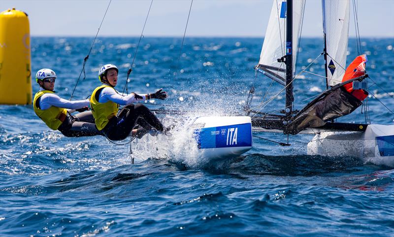 Ruggero Tita and Caterina Banti (ITA) in the Nacra 17 class on day 8 of the Tokyo 2020 Olympic Sailing Competition photo copyright Sailing Energy / World Sailing taken at  and featuring the Nacra 17 class