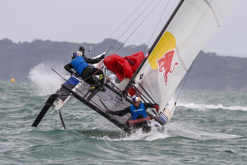 Santi Lange (ARG) comes close to going over the side during a mark rounding - Medal Race, Nacra 17 - Hyundai Worlds - December 2019 photo copyright Richard Gladwell / Sail-World.com taken at Royal Akarana Yacht Club and featuring the Nacra 17 class