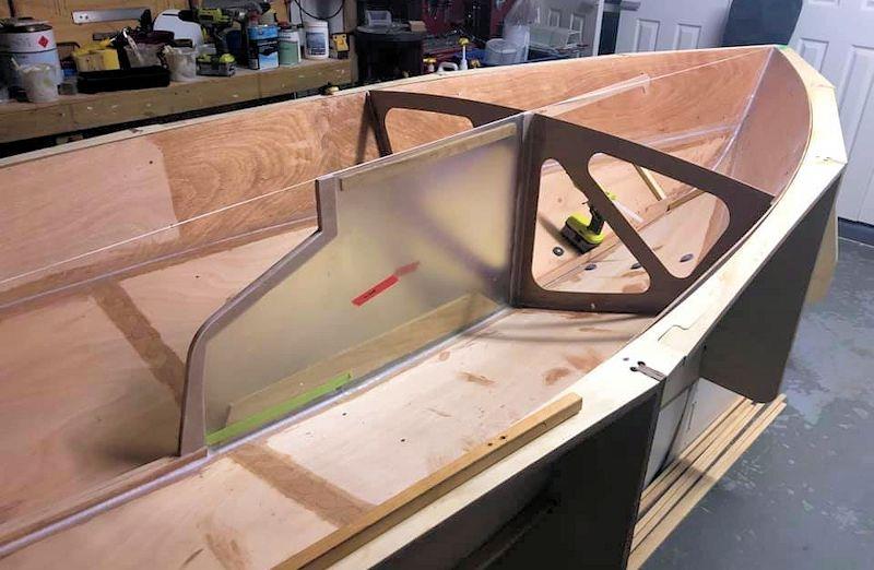 Damien Widdy (Australia) builds his own OK dinghy - assembling the boat in the supplied jig - photo © OK Oz
