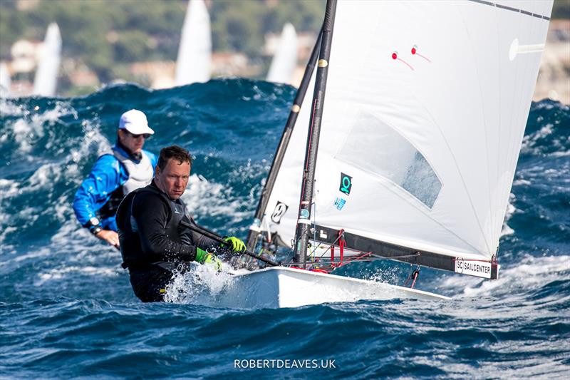 Nick Craig chases Stefan de Vries on day 3 of the OK Dinghy Europeans in Bandol photo copyright Robert Deaves / www.robertdeaves.uk taken at Société Nautique de Bandol and featuring the OK class