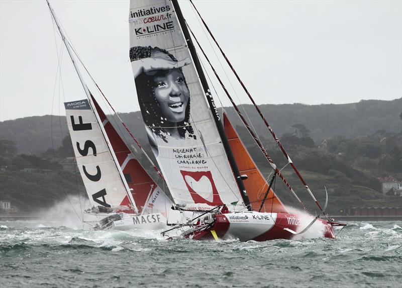 MACSF and Initiatives-Cœur passes Hurst Castle after the Rolex Fastnet Race start photo copyright Mark Jardine taken at Royal Ocean Racing Club and featuring the IMOCA class