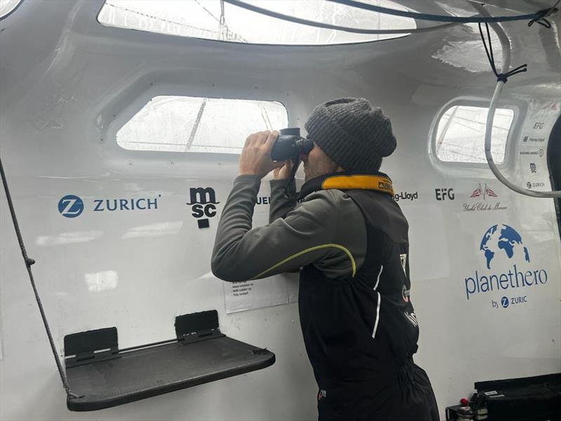 Image of Nico Lunven watching as Team Malizia sailed past 11th Hour Racing photo copyright Antoine Auriol / Team Malizia taken at  and featuring the IMOCA class