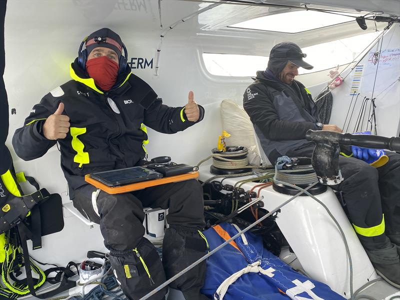 The Ocean Race 2022-23 Leg 3, Day 29 onboard Biotherm. Anthony Marchand and OBR Ronan Gladu trying to work in the cold weather - photo © Ronan Gladu / Biotherm / The Ocean Race
