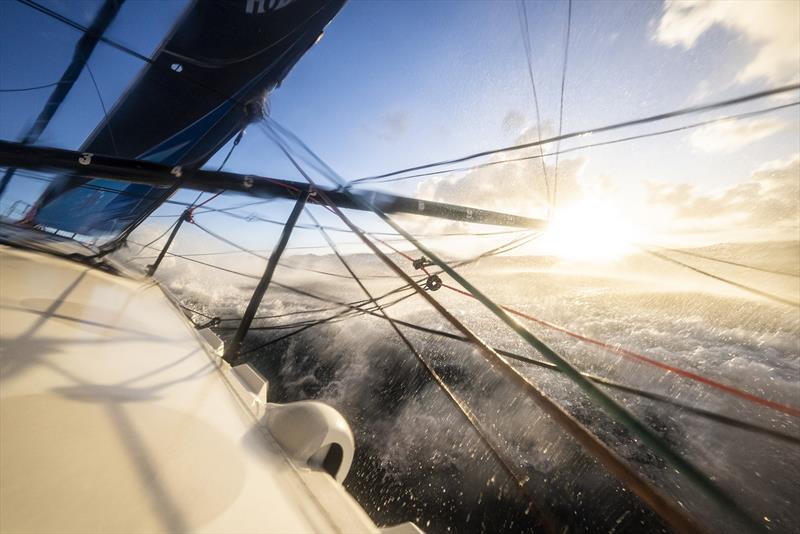 The Ocean Race 2022-23 - May 07 , Leg 4 onboard 11th Hour Racing Team. Malama going upwind at sunrise in a messy sea state photo copyright Amory Ross / 11th Hour Racing / The Ocean Race taken at  and featuring the IMOCA class