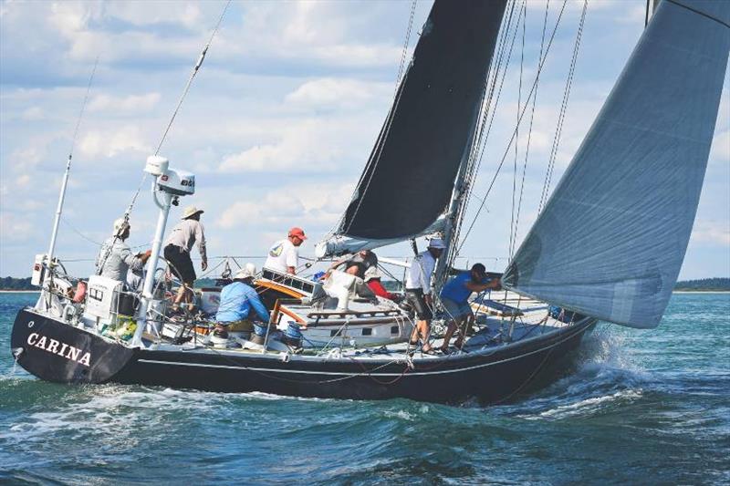 Rives Potts at the helm of Carina photo copyright Barby MacGowan taken at  and featuring the PHRF class