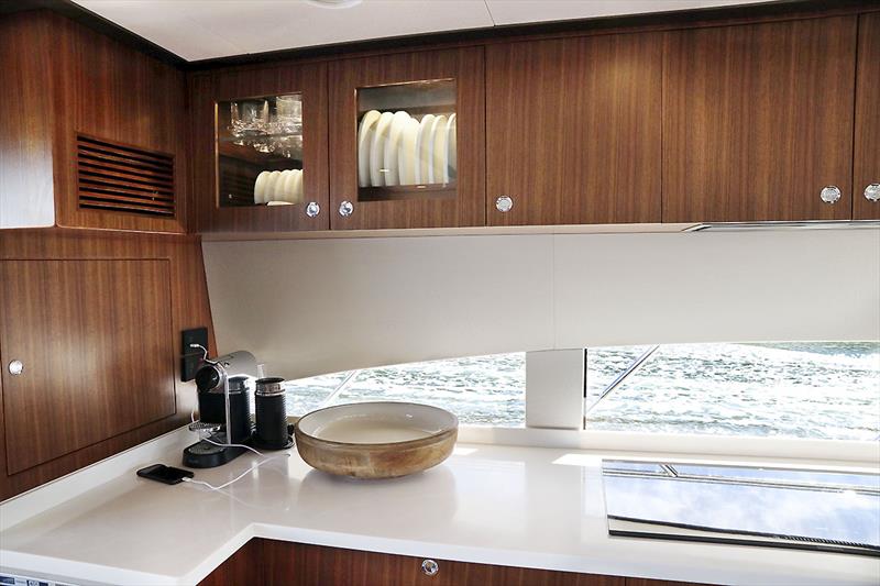 Crockery cabinet in the galley of the Longreef 60 SX - photo © Jennifer McKinnon