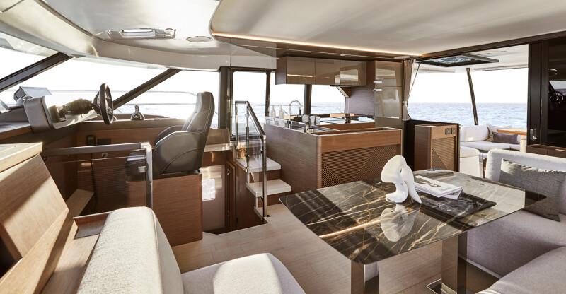 Helm, dinette, and galley - Prestige's new M48 powercat photo copyright Prestige Yachts taken at  and featuring the Power boat class