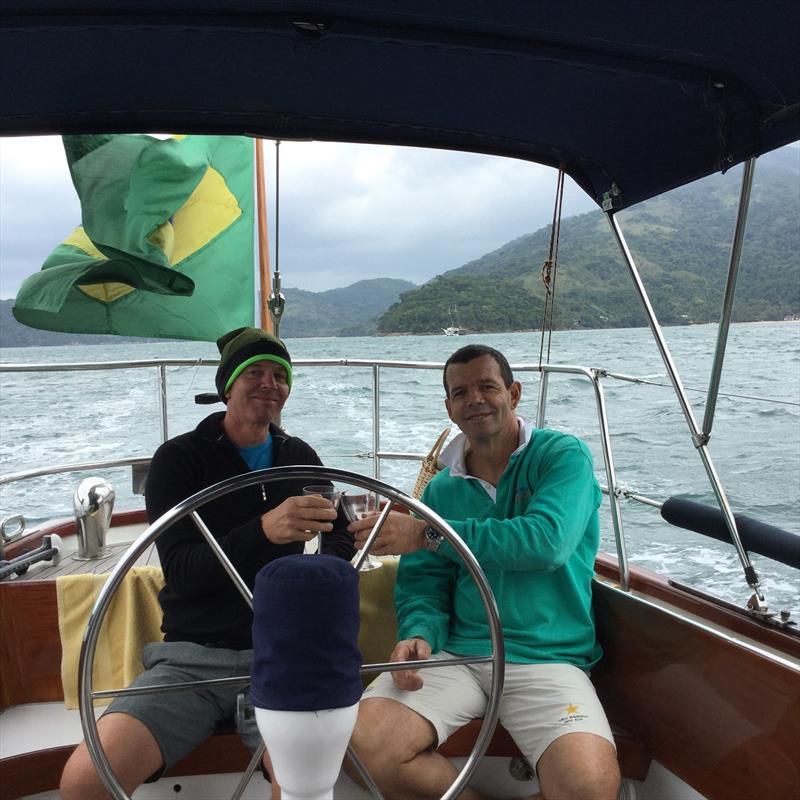 Hamish Willcox & Torben Grael enjoying a drink and a cruise - they became friends after working together on the Luna Rossa America's Cup campaign in 2000 photo copyright Hamish Willcox taken at  and featuring the  class
